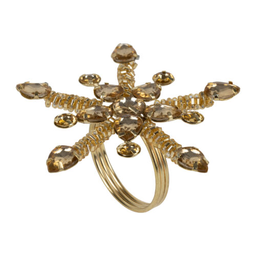Argola dourada de guardanapo com floco de neve e pormenores brilhantes