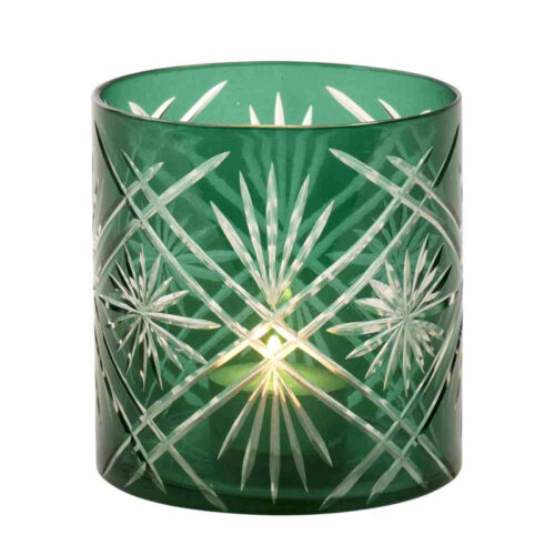Porta-velas verde com motivos de estrelas.